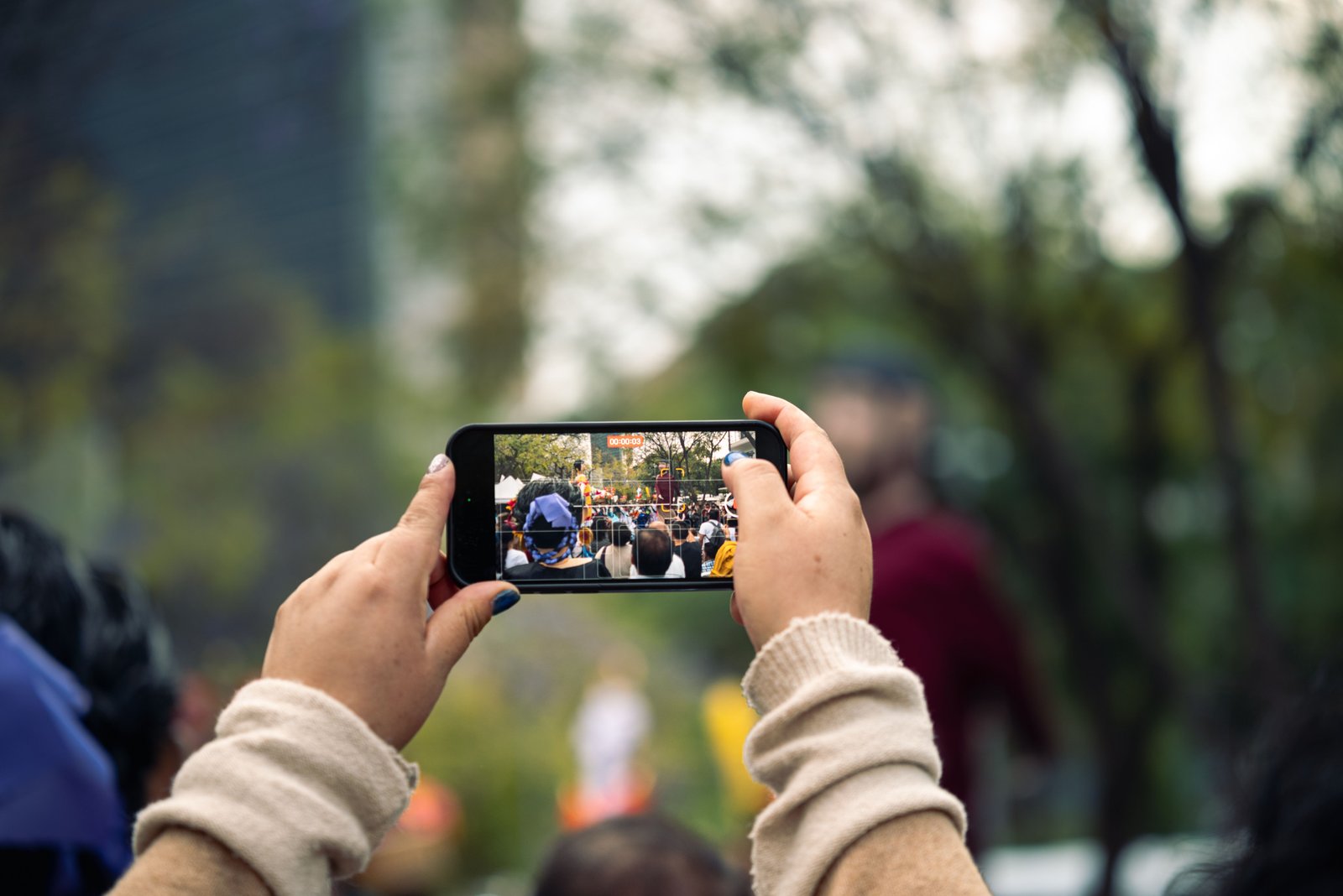Guest capturing an event on their phone
