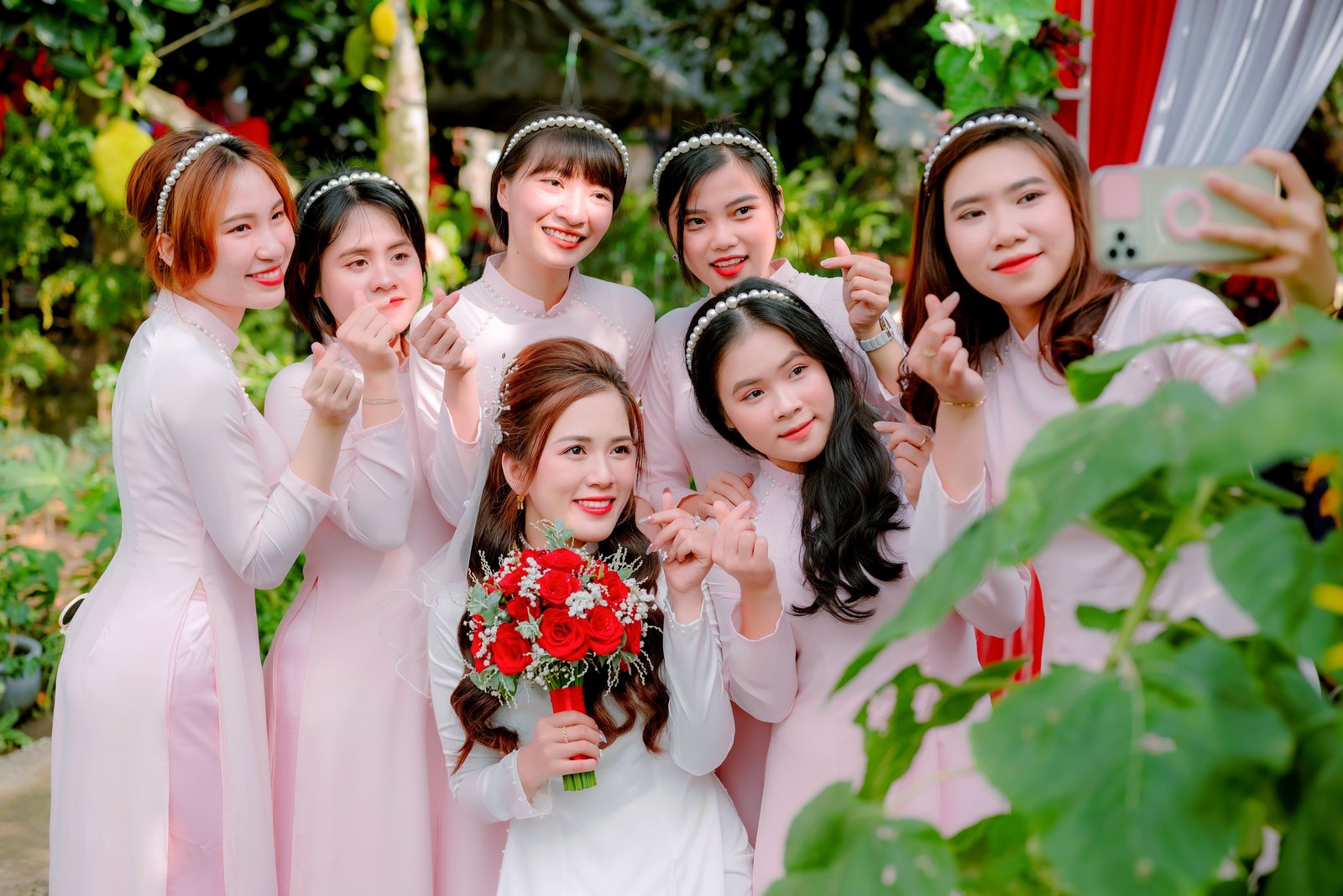 Wedding guests taking a group selfie